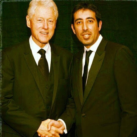 Kaiser Khan shaking hands with President Bill Clinton